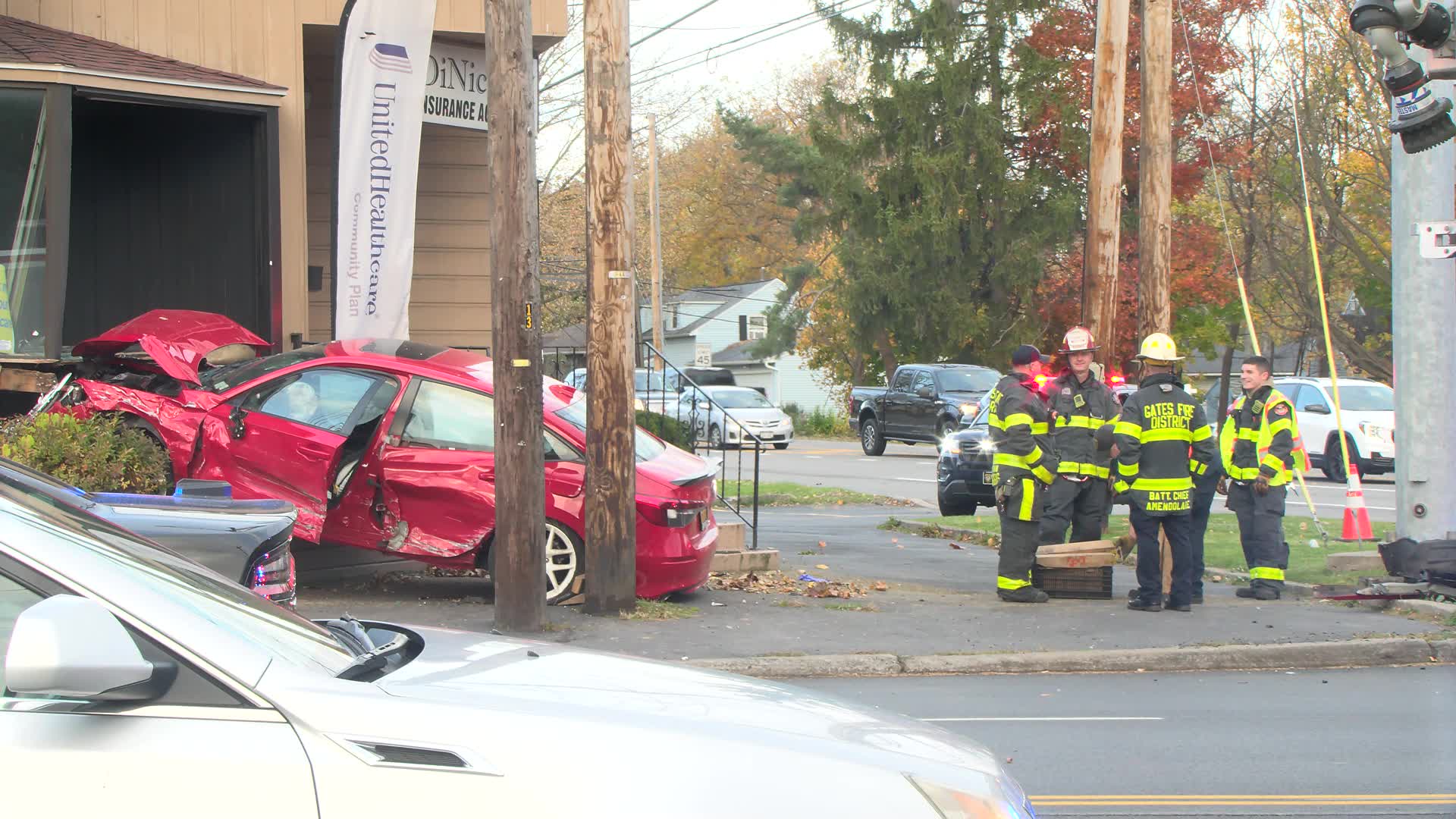 Two hospitalized after crash ends with car going into building in Gates ...
